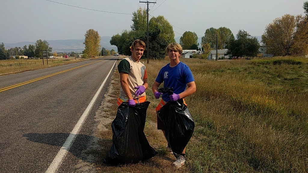 Students picking up garbage