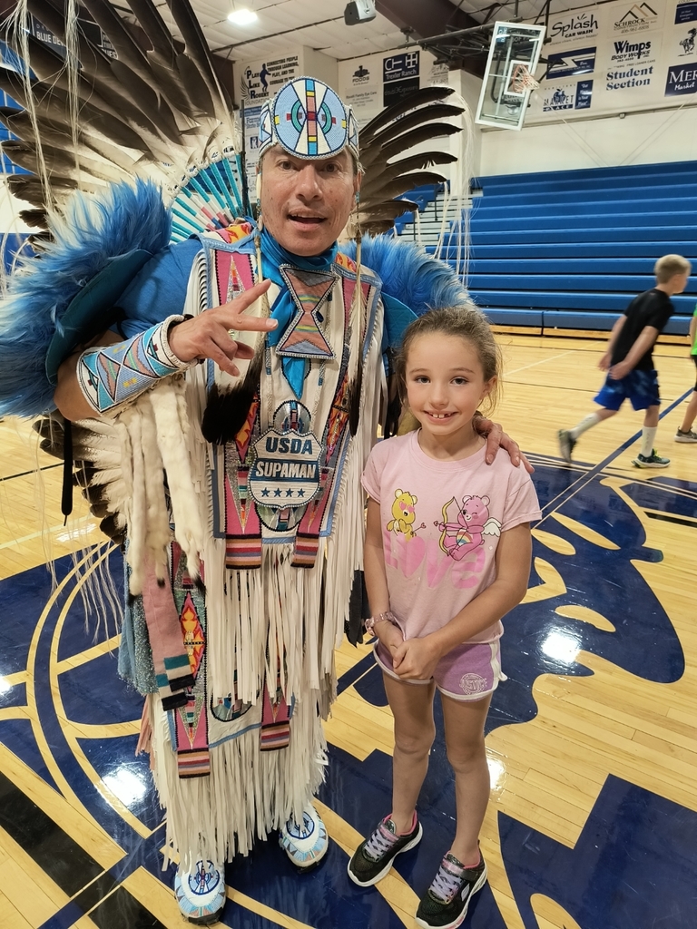 girl with native American dancer